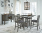 Hallanden Counter Height Dining Table and 4 Barstools with Storage